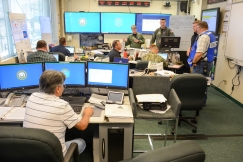 Members of the Naval Air Station Whidbey Island Emergency Operations Center (EOC) work through the recovery operations after a simulated major earthquake and subsequent aftershocks during Citadel Rumble 2019. Citadel Rumble is an annual exercise helps maintain and improve installation support and recovery efforts before, during, and after a major all-hazards event. During this exercise the NAS Whidbey Island EOC was purposely understaffed to simulate the difficulty in traveling after a major earthquake. As well, communications were cut off, except through satellite communications, so the EOC staff had to face the difficulties of an isolated environment.